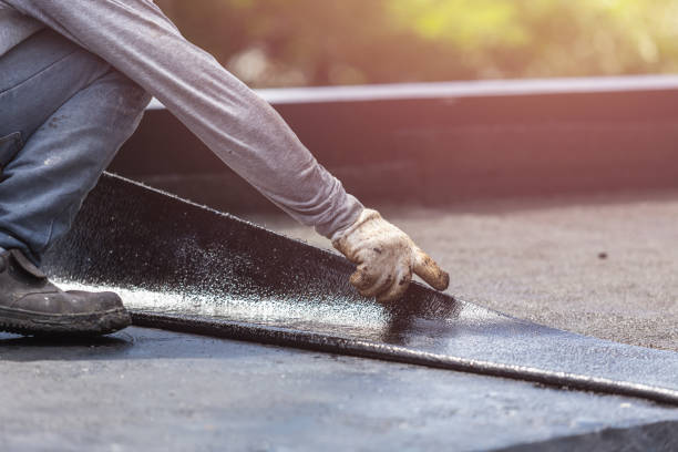 Professional Waterproofing technician working in Harwood, MD